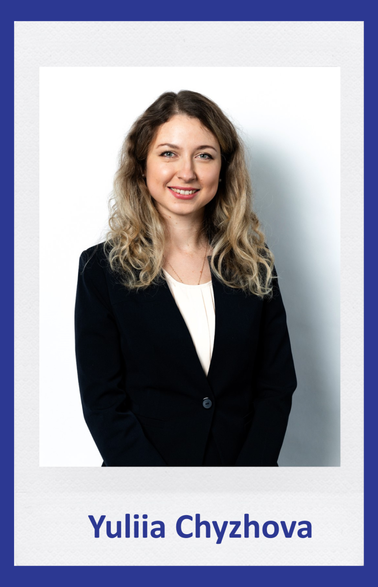 A professional portrait of Yuliia Chyzhova, wearing a black blazer and white blouse, representing Katzarov SA.